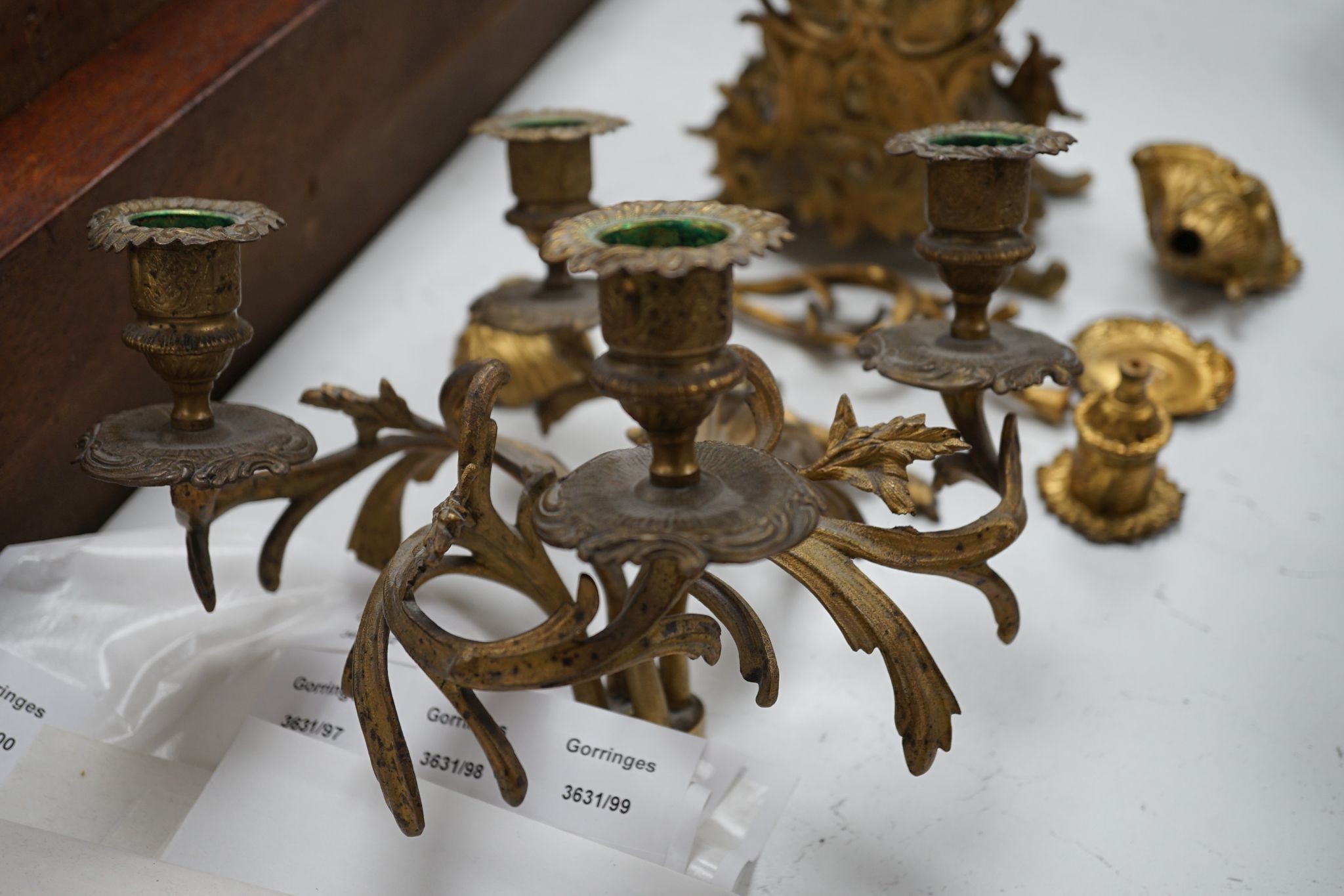 A pair of gilt brass five light candelabra 56cm